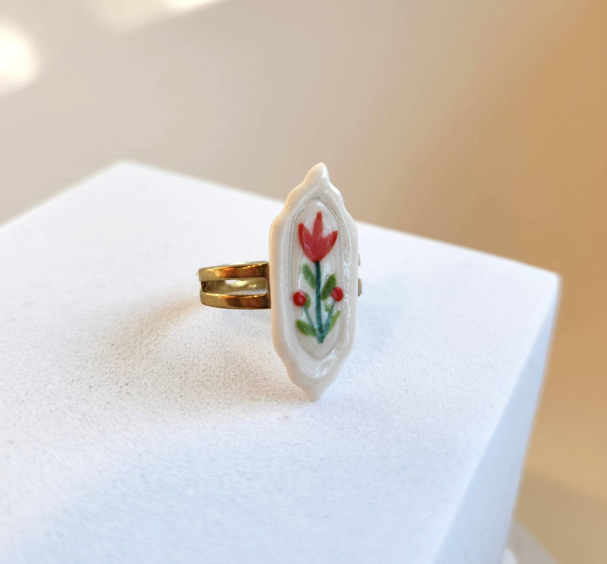 Framed floral ring